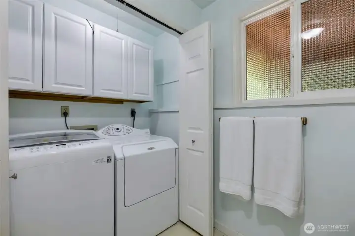 Lower level utility room with 3/4 bath