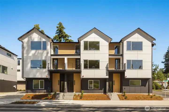 Welcome to Grove Pointe! Beautiful, modern townhome exterior featuring contemporary architectural lines and clean design. Welcome to Grove Pointe! Beautiful, modern townhome exterior featuring contemporary architectural lines and clean design.