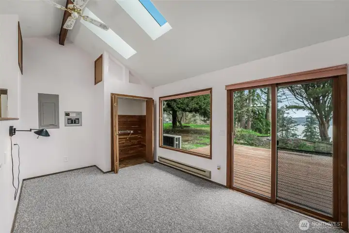 One of the two bedrooms, this one with an ensuite also has direct access to the outdoors and beautiful views.
