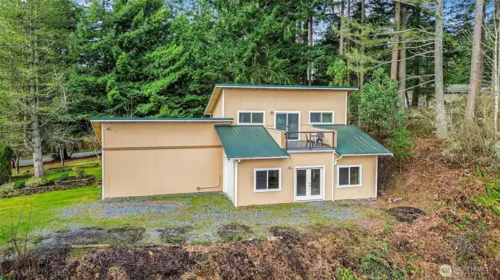 The shop!  This property features a large shop with garage doors and a bonus suite upstairs.