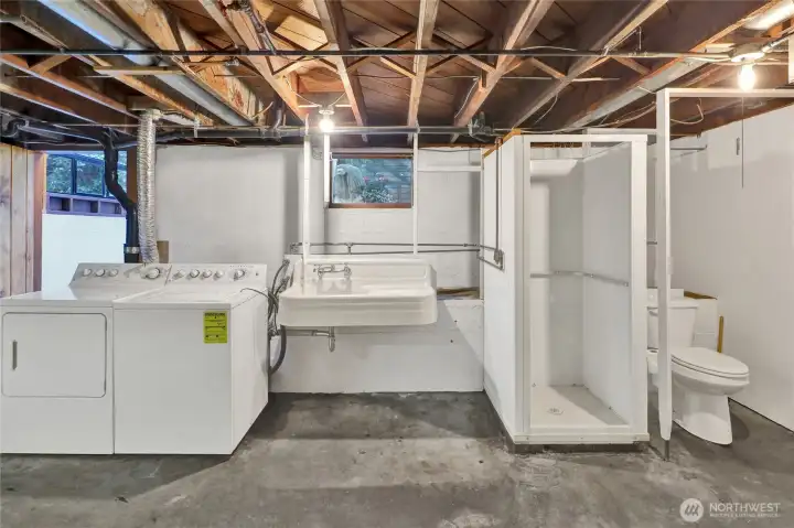 The basement utility, includes large utility sink, shower, toilet. The basement utility, includes large utility sink, shower, toilet.
