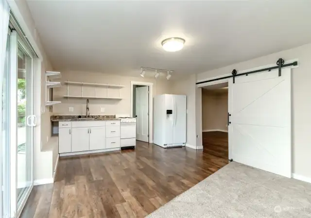 Finished basement w/ mini kitchen, rec room and 2 potential bedrooms (potential rental). Slider to patio and lake/mountain views