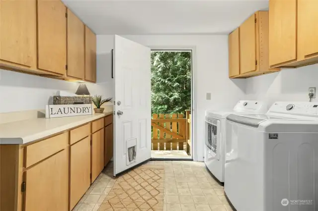 Laundry room with access to dog run.