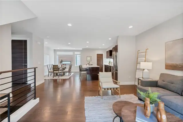 Hardwoods throughout the unit. Powder room and walk in pantry complete the quartz countertop and piano finish cabinety, soft close drawers and modern doors with metal accents complete this gorgeous style.