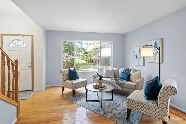 Foyer to front living room, one of two living areas.