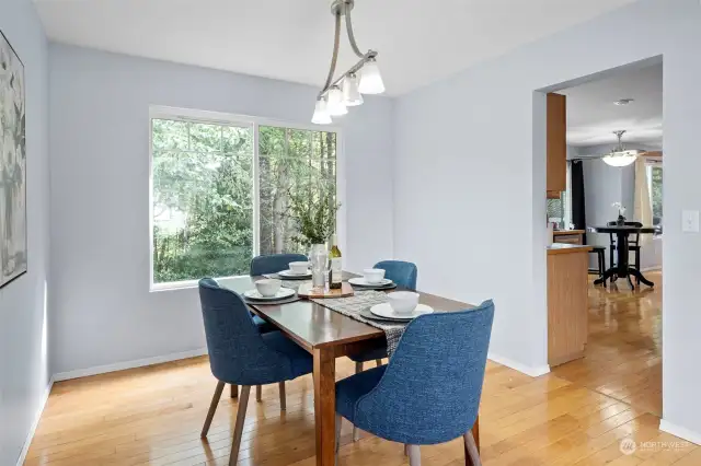 Formal dining room for entertaining, looks out to the greenbelt.