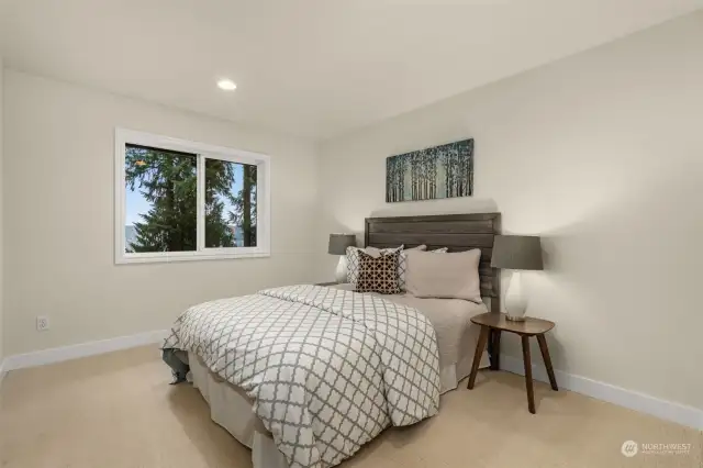 Spacious Upstairs Bedroom #2 with lake views.