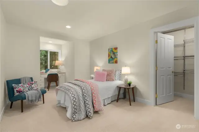 Upper Bedroom #3 with walk-in closet and built-in workspace.