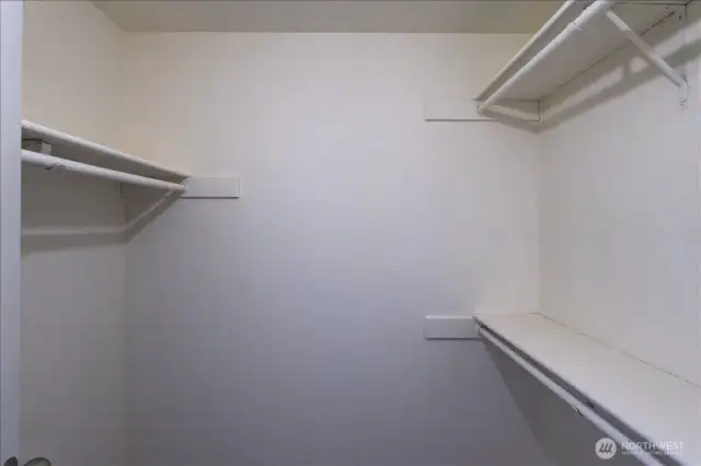 Primary walk-in closet.