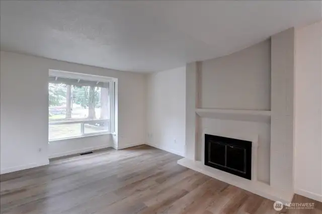 Sunken living room - there will be a new wood burning fireplace insert installed mid-April.