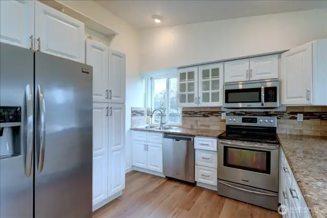 Granite countertops, pantry and all stainless steel appliances will convey with the home.