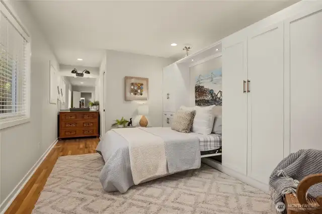 This is the front bedroom with a built in closet system and murphy bed.  Each bedroom has its own private bath as well.