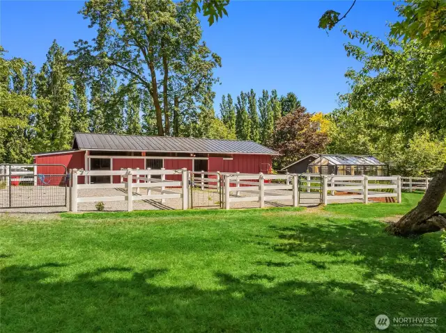 A three stall barn with three paddocks. The paddocks have a hoof grid stystem installed for drainage.