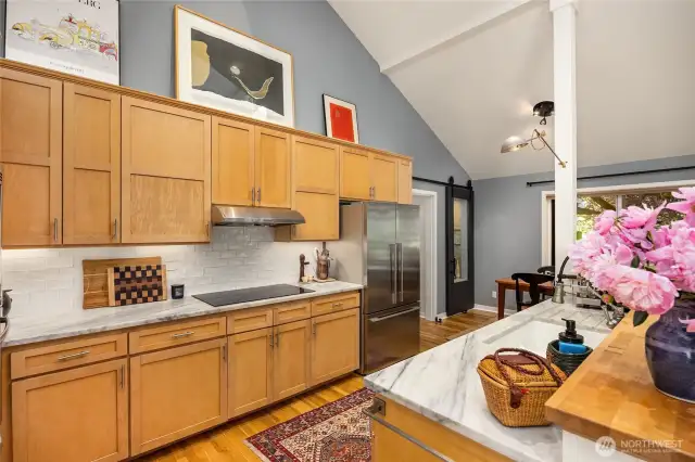 This updated kitchen features beautiful quartz counters and a brand new induction cooktop!