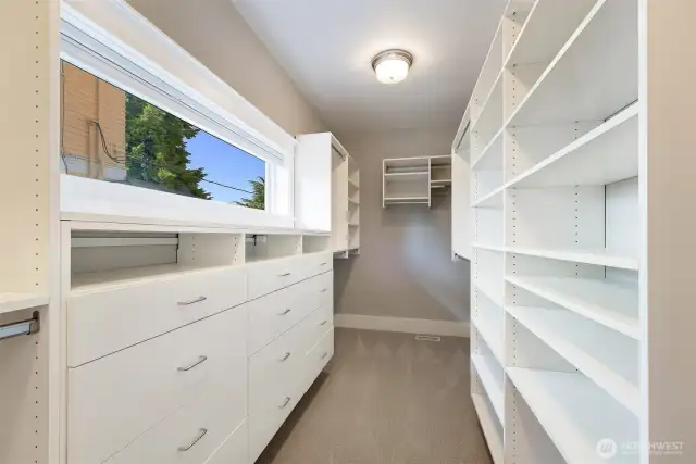 Walk in closet primary bedroom.