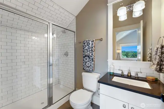 Three quarter bathroom on the third floor.