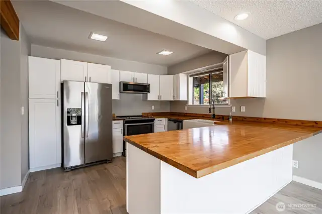 Newer appliances in updated kitchen