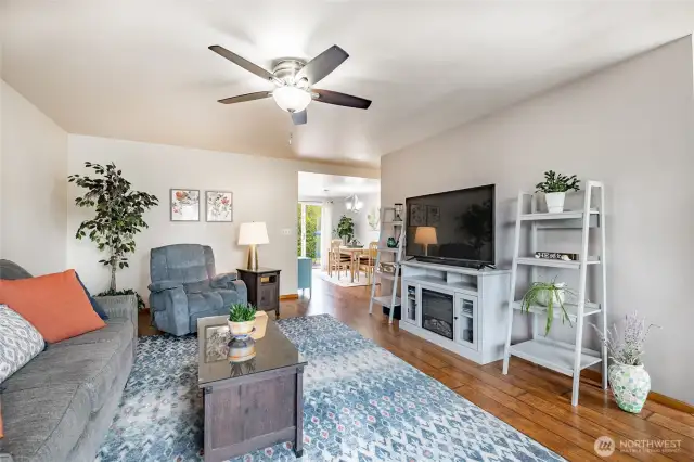 Living room opens to dining and kitchen