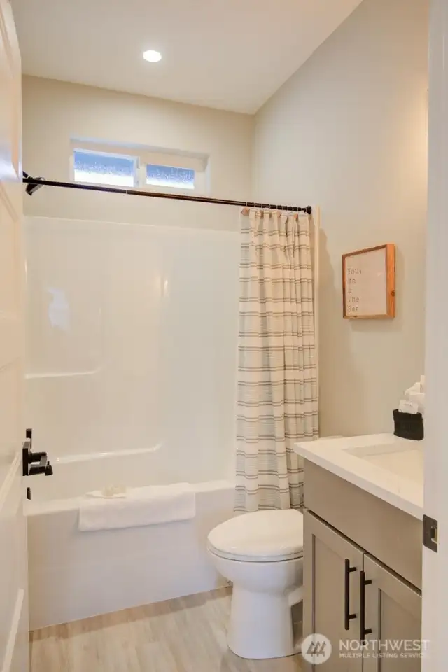 Guest bath with bathtub.