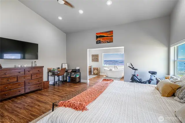 Primary bedroom opens to luxury bath