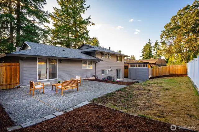 The fully fenced backyard features updated fencing for added privacy.