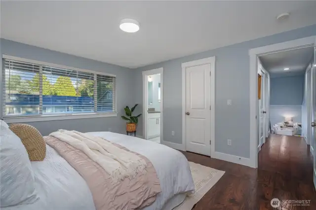 It offers a large picture window, an ensuite bath, and walk-in closet.