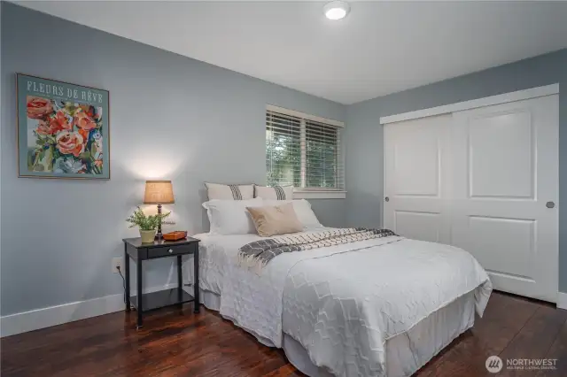 The larger of the two additional upstairs bedrooms features a generous closet.