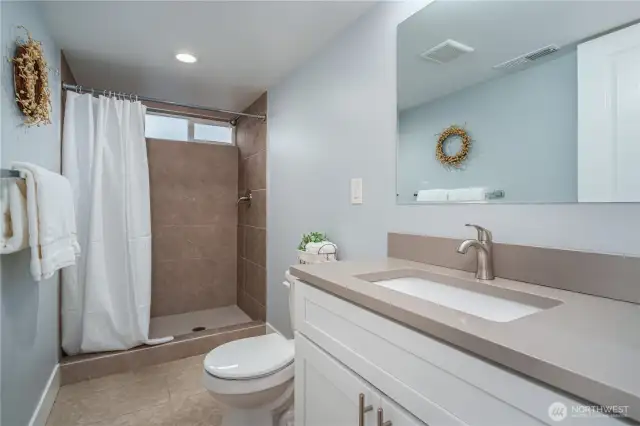 A stylish ¾ bath with beautiful finishes makes this level ideal for multi-generational living.