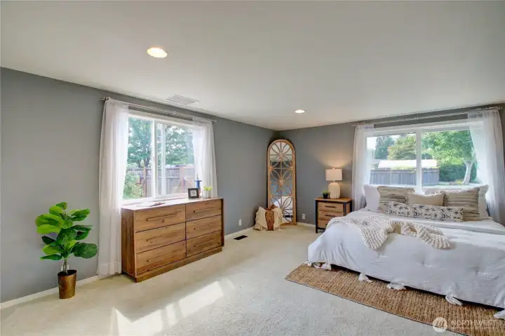 Spacious primary bedroom located at opposite end of home.