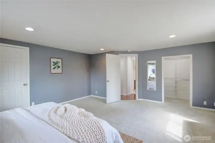Primary bedroom with 2 closets, walk in closet on the right.