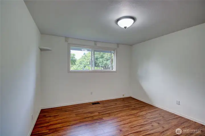 2nd bedroom off of front hall facing the front of the home.