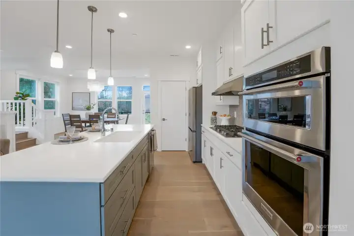 Stainless steel appliances complement the design, blending beauty with everyday functionality.