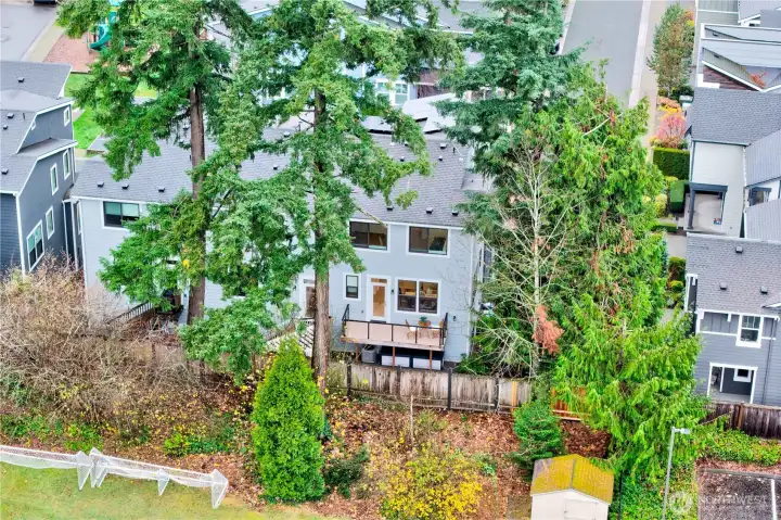 From the rear, the drone captures the home’s custom-built deck, perfectly designed for outdoor living.