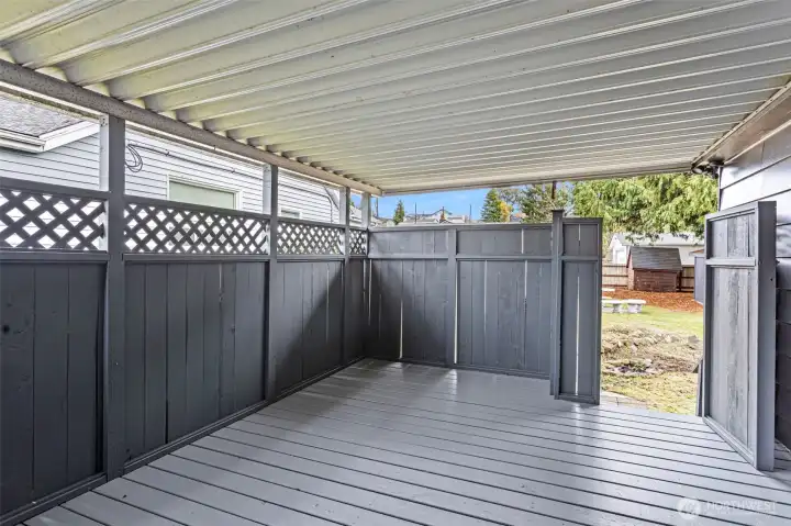 Covered Patio leading to back yard.