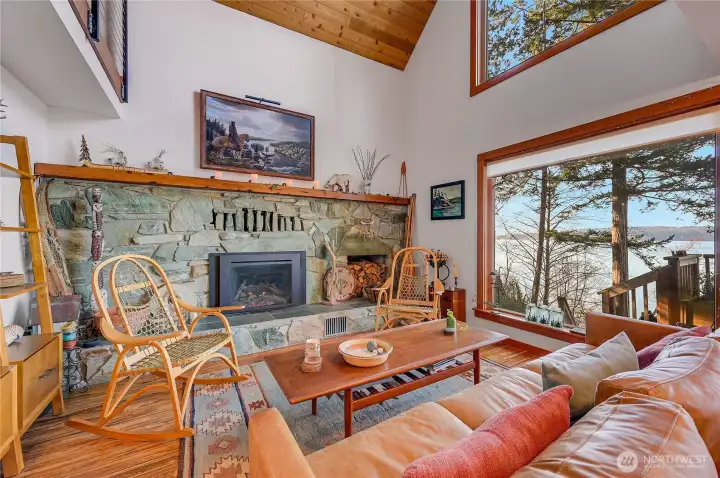 Real stone fireplace with gas insert warms the home on cooler days