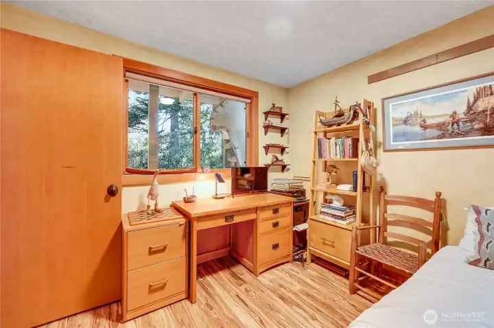 Guest bedroom window looks out to front yard.