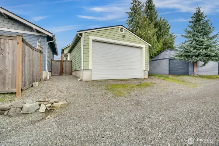 The 2-car detached garage was most recently used not just for parking, but also as an artist's studio. The homeowner even had the gravel regraded at the entrance to make it easy to pull in.