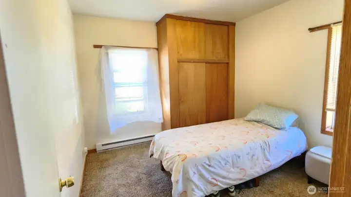 Main floor bedroom one in main house
