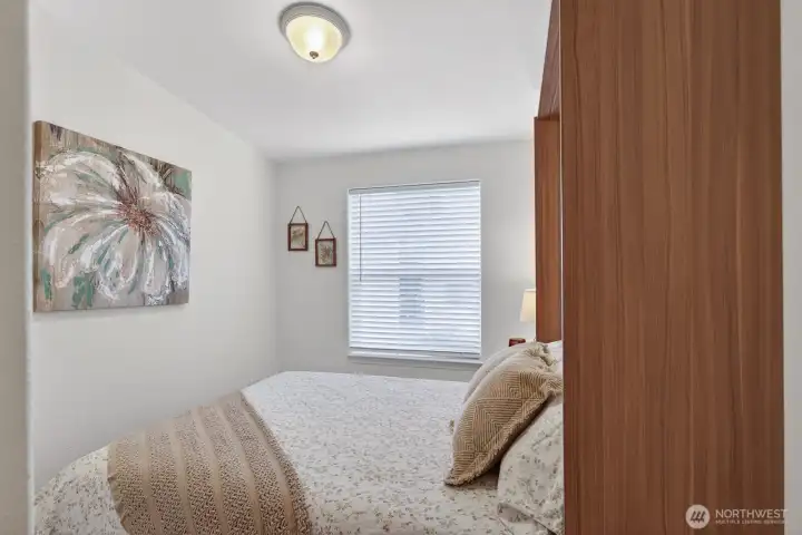 Murphy bed down, stays with the house