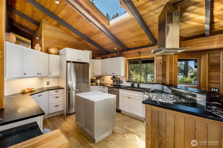 Completely renovated kitchen with soapstone countertops and subway tile.