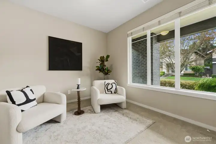 This is a view from the Office/Den just inside the front door of the home. Look at the large viewing window.