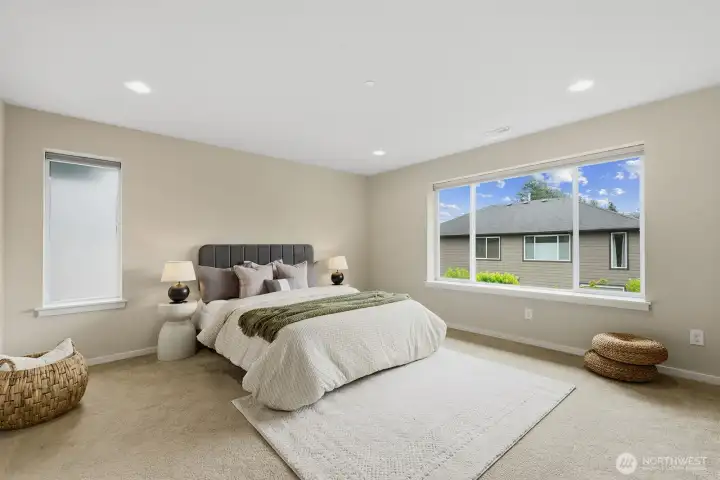 2nd floor primary bedroom features an ensuite 5-piece bath and a large walk in closet