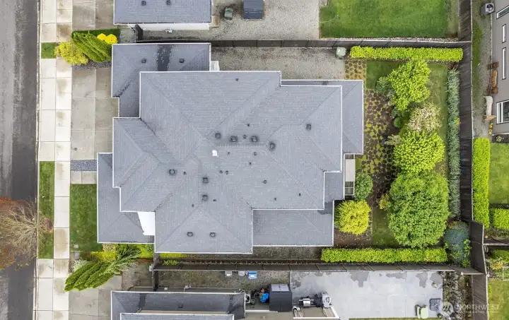 Overhead view of the property. Look at the backyard. The sellers have done a wonderful job of bringing in landscapping and adding trees for privacy.