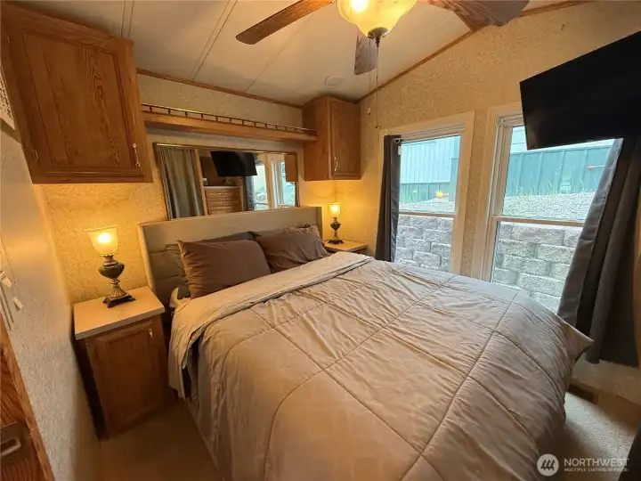 Queen size bed in generous bedroom
