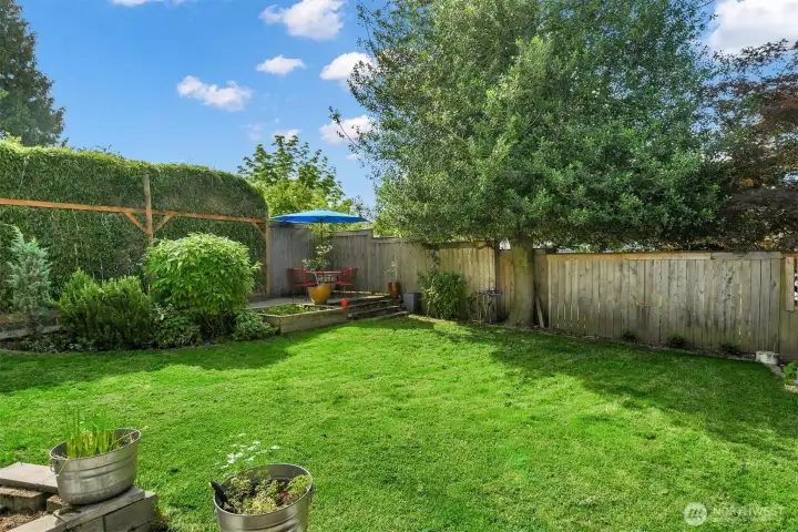 Generous, private and level backyard Generous, private and level backyard