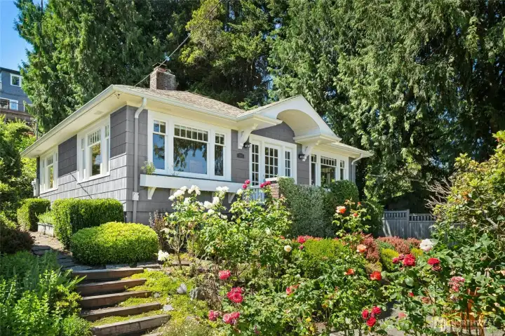 Soft spoken, this beguiling bungalow will provide comfort and welcome all to enjoy summer garden parties!
