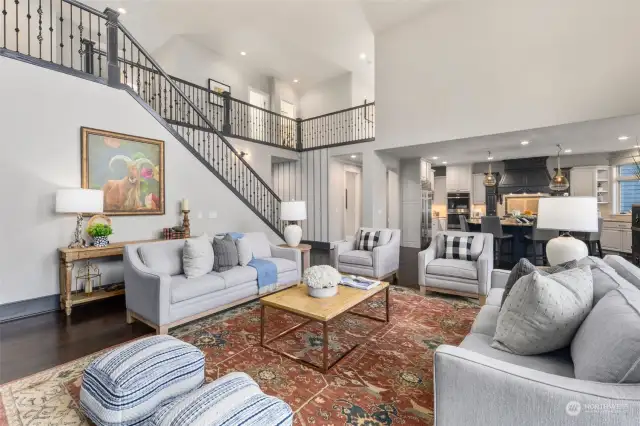 Beautiful Hardwood Floors Flow Throughout And The Elegant Wrought Iron Staircase Adds A Touch Of Sophistication And Timeless Beauty To The Home.