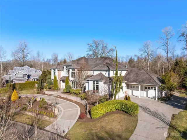 Two Driveways Lead You To The Home - One Of Those Being A Circular Drive.