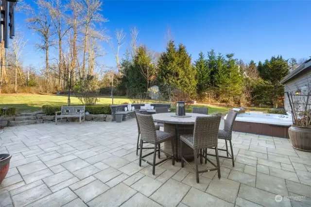 Large Stone Patio With Two Gas Fireplace Areas Is The Perfect Space For Outdoor Entertaining. Large, Level Lot With In-Ground Sprinkler System And Landscape Lighting.