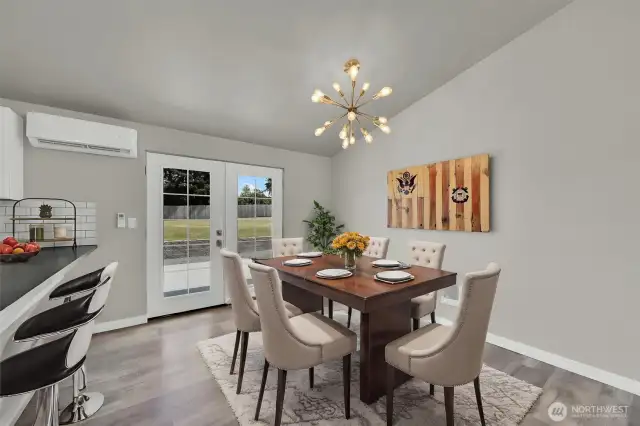 Updated to french doors that lead to the backyard off the dining area